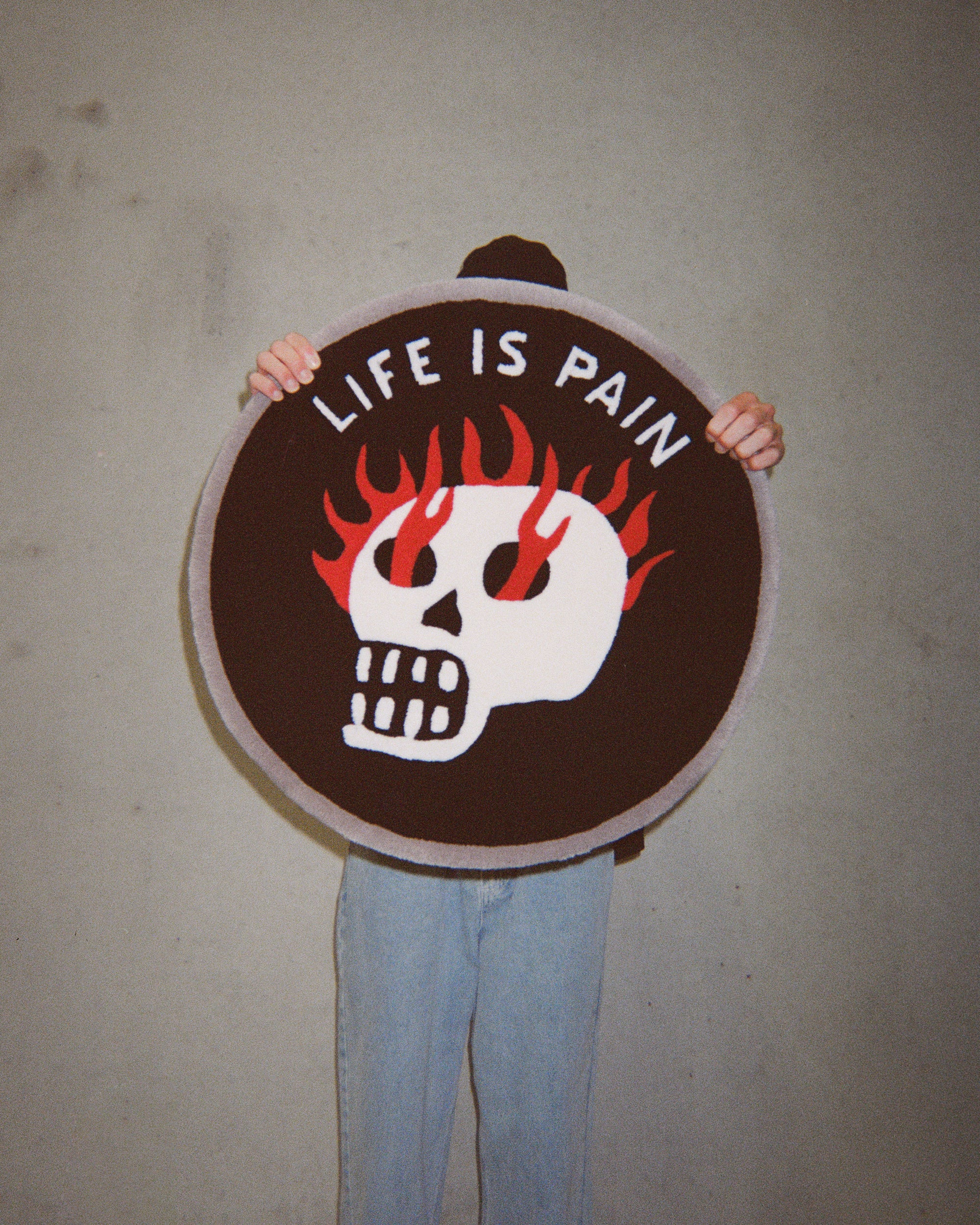 Life Is Pain Round Rug